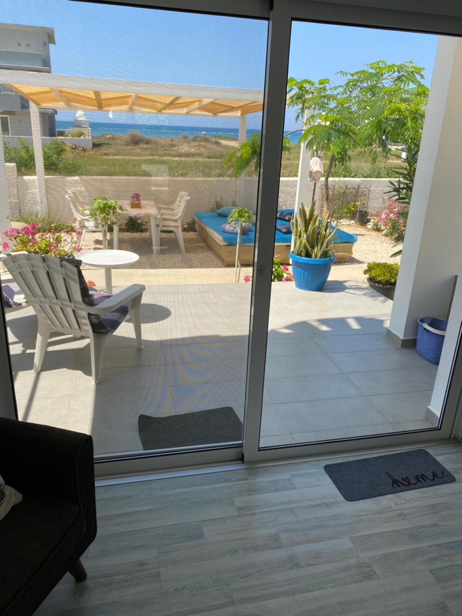 Cozy Beach House Перволия Экстерьер фото