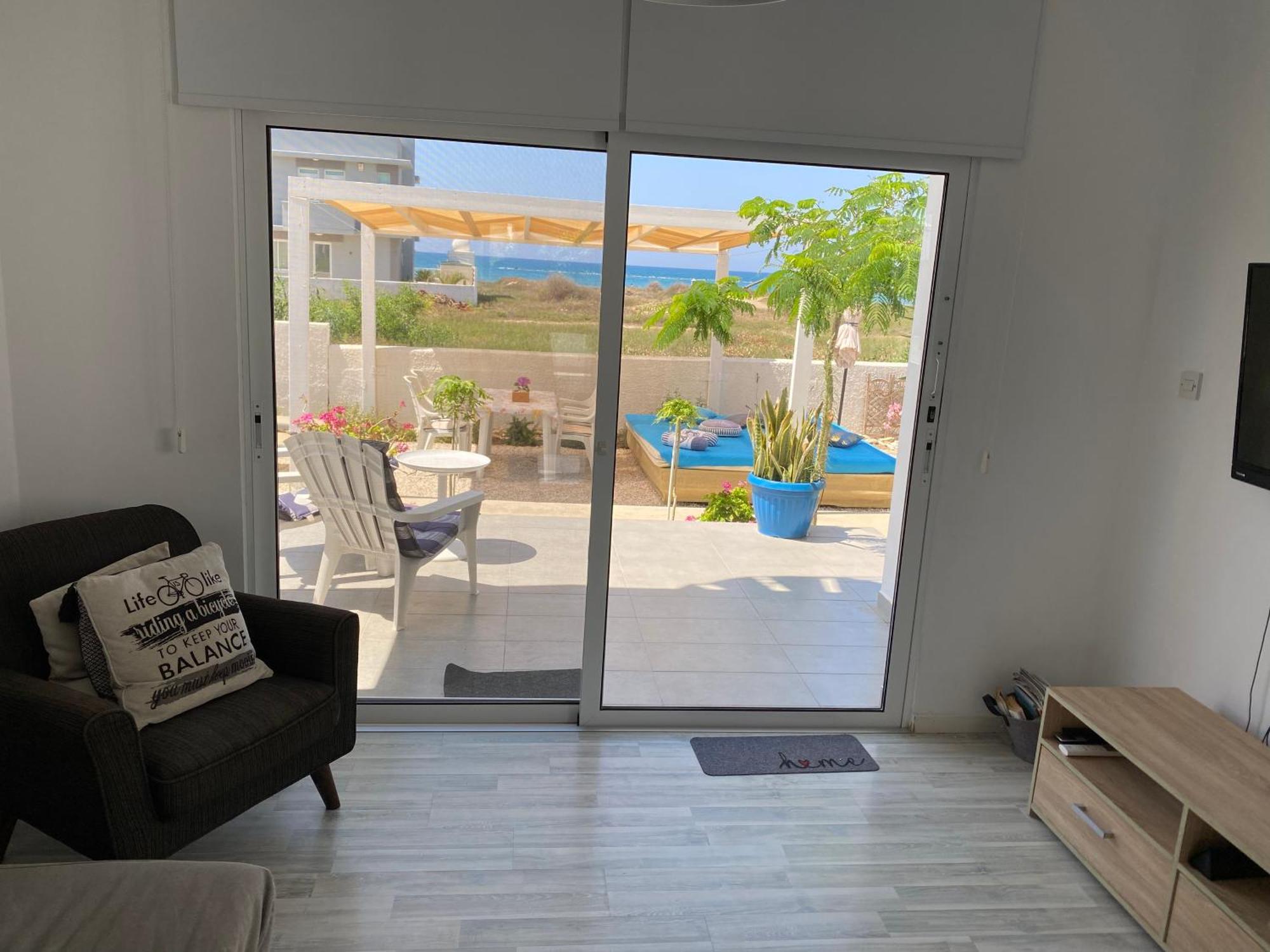 Cozy Beach House Перволия Экстерьер фото