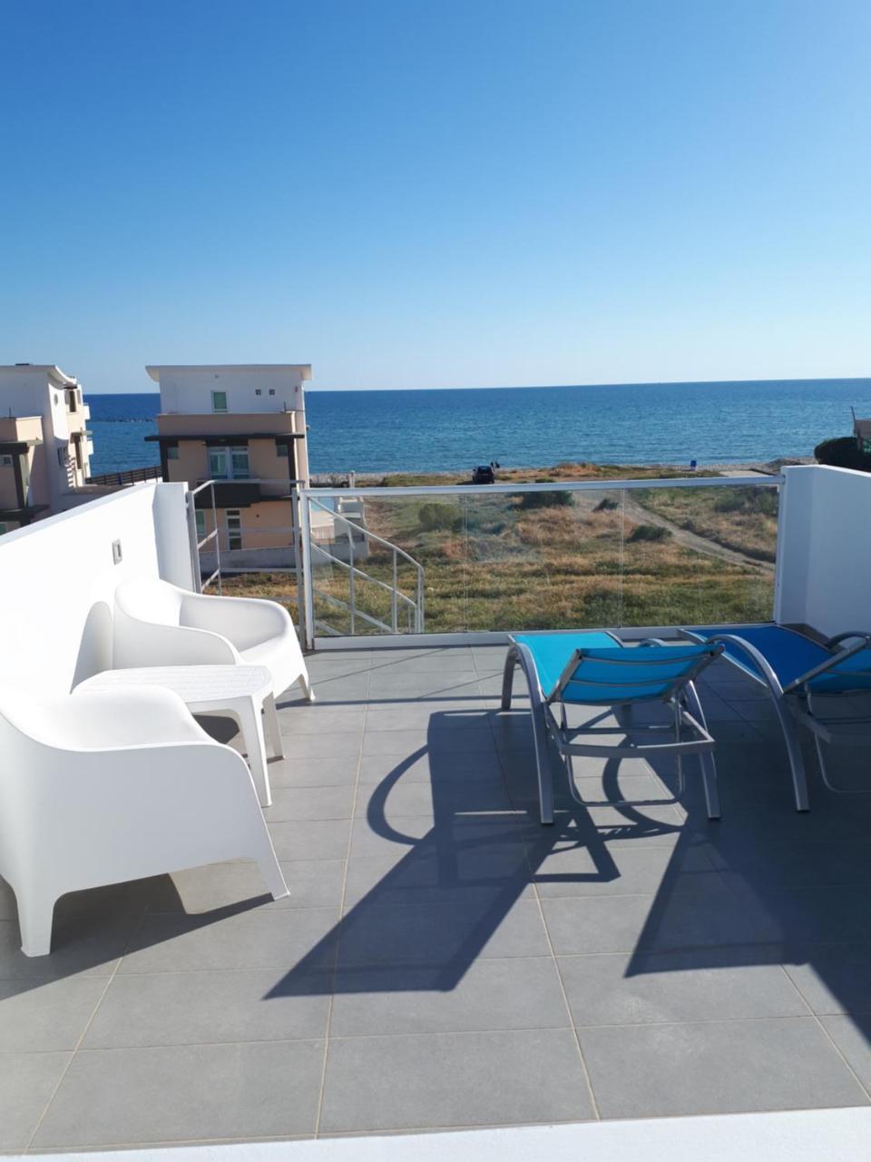 Cozy Beach House Перволия Экстерьер фото