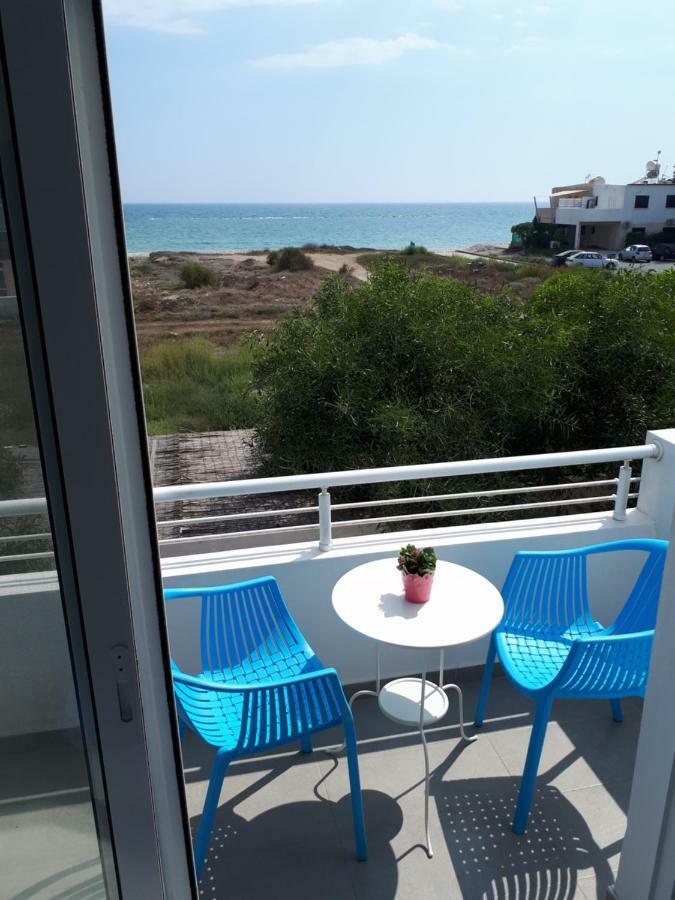 Cozy Beach House Перволия Экстерьер фото